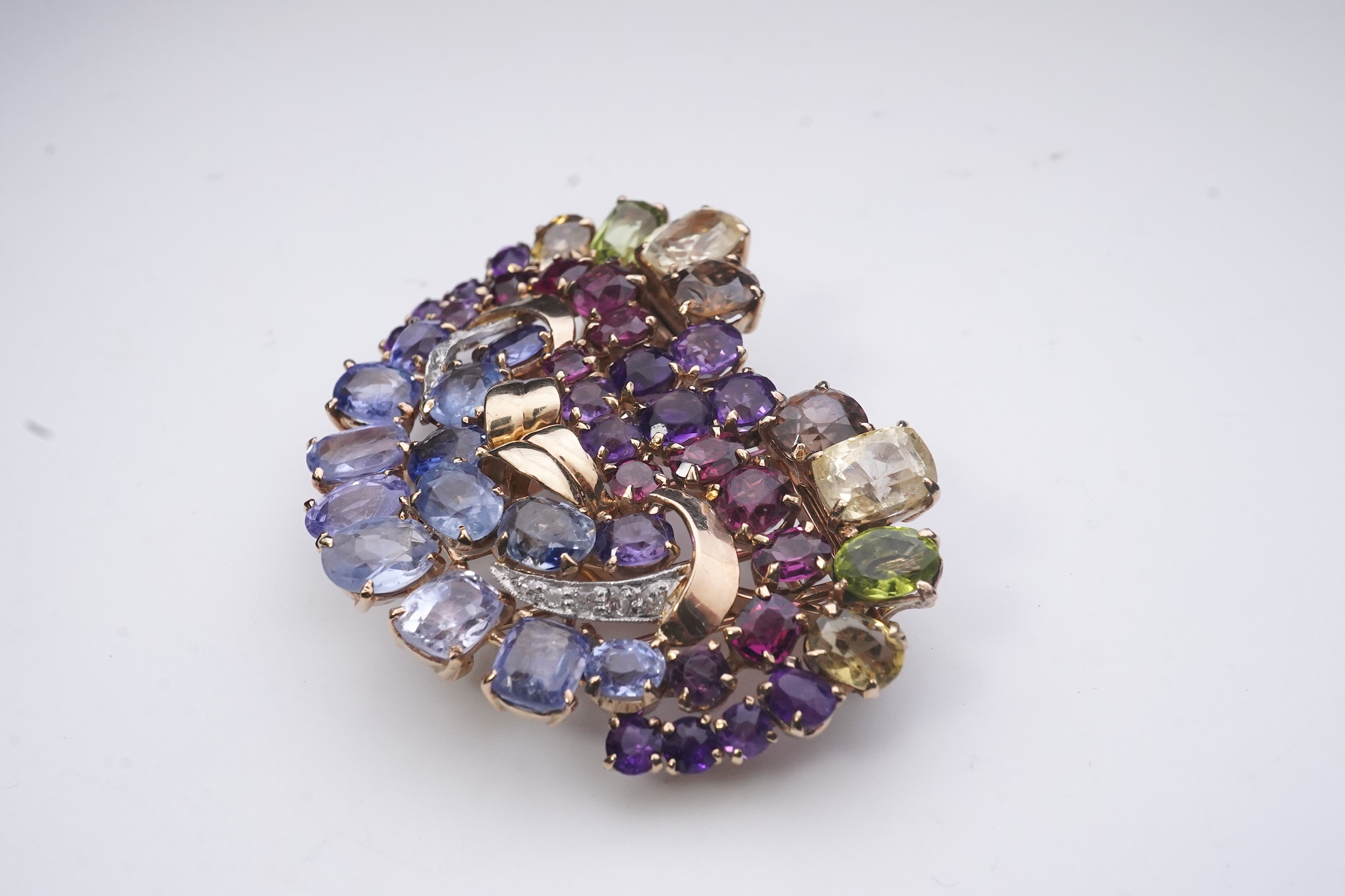 A Retro sapphire and multi-gem double clip brooch, circa 1940